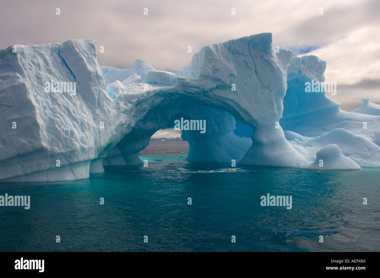 arched-iceberg-floating-off-the-western-antarctic-peninsula-antarctica