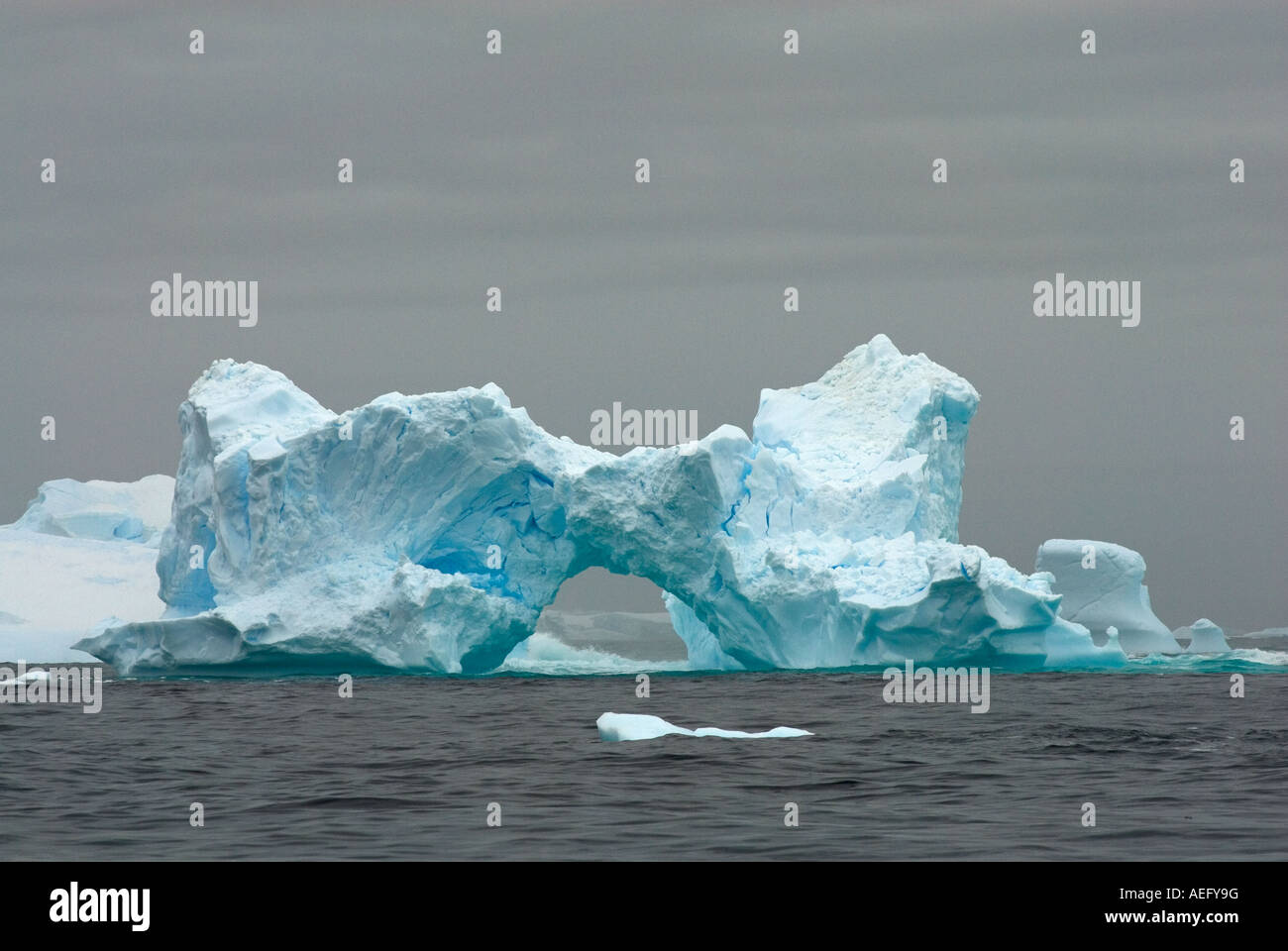 arched-iceberg-floating-off-the-western-antarctic-peninsula-antarctica
