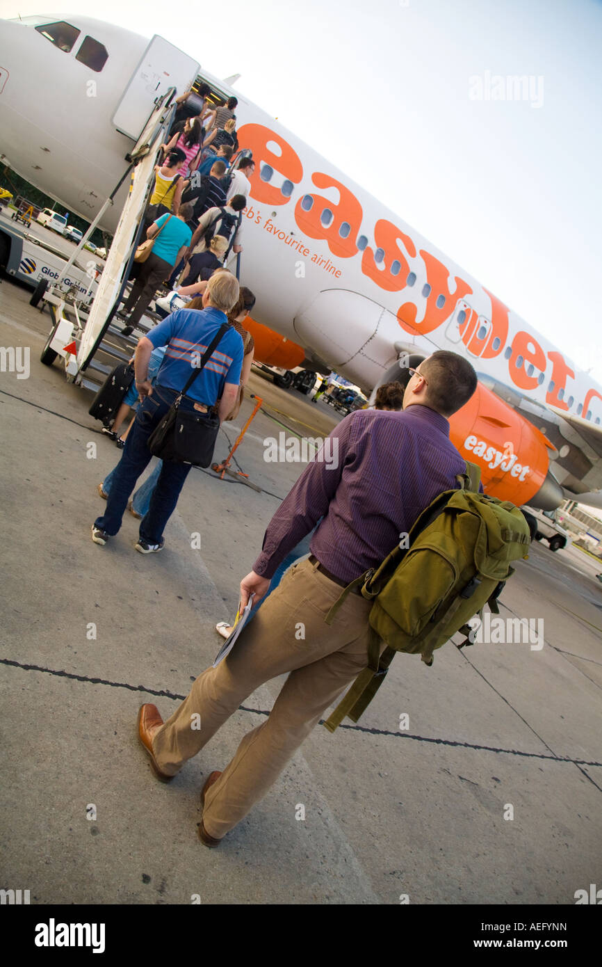 Passengers Boarding EasyJet Aircraft in Schoenefeld Airport Berlin Germany Stock Photo