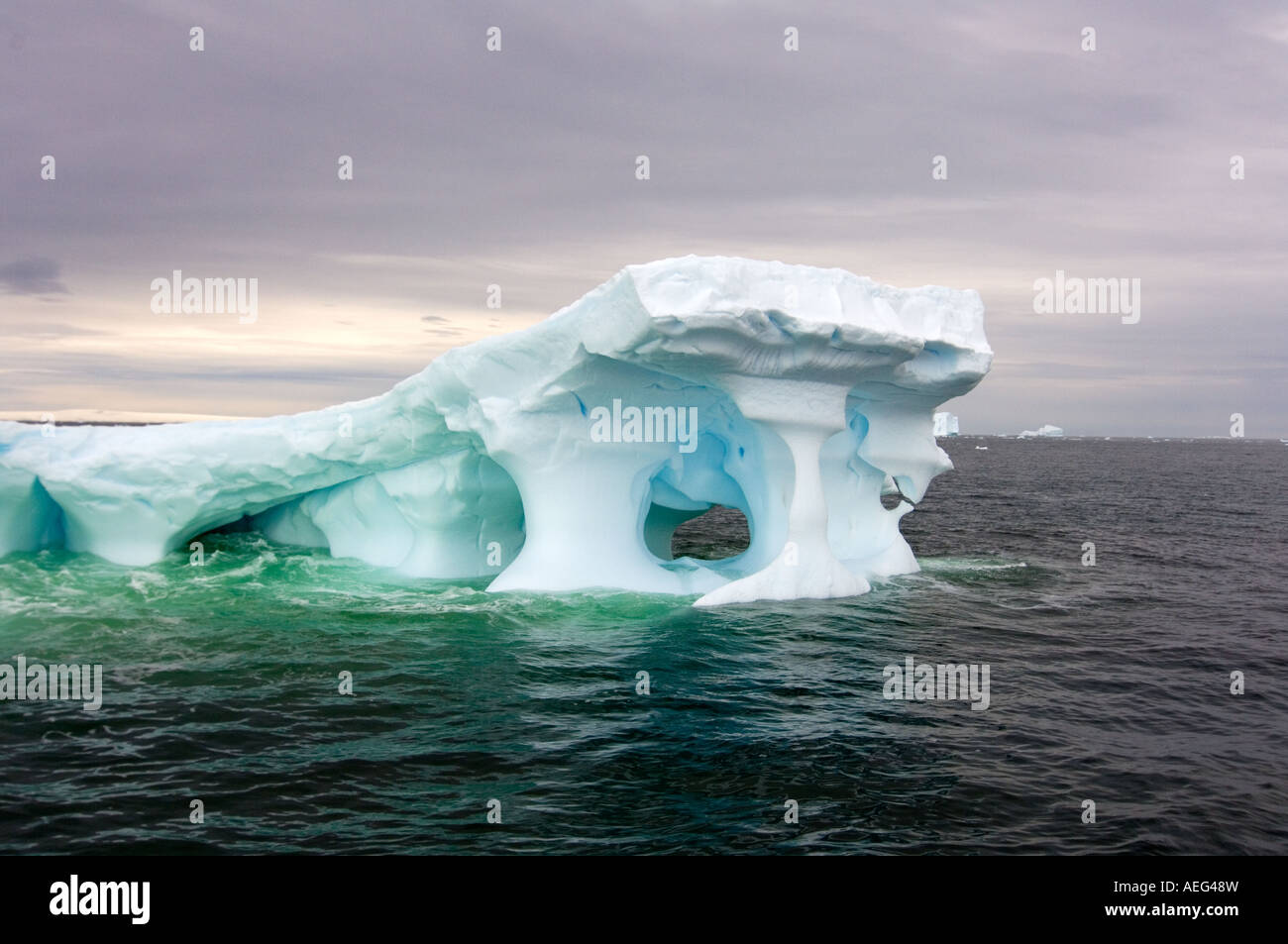 arched-iceberg-floating-off-the-western-antarctic-peninsula-antarctica
