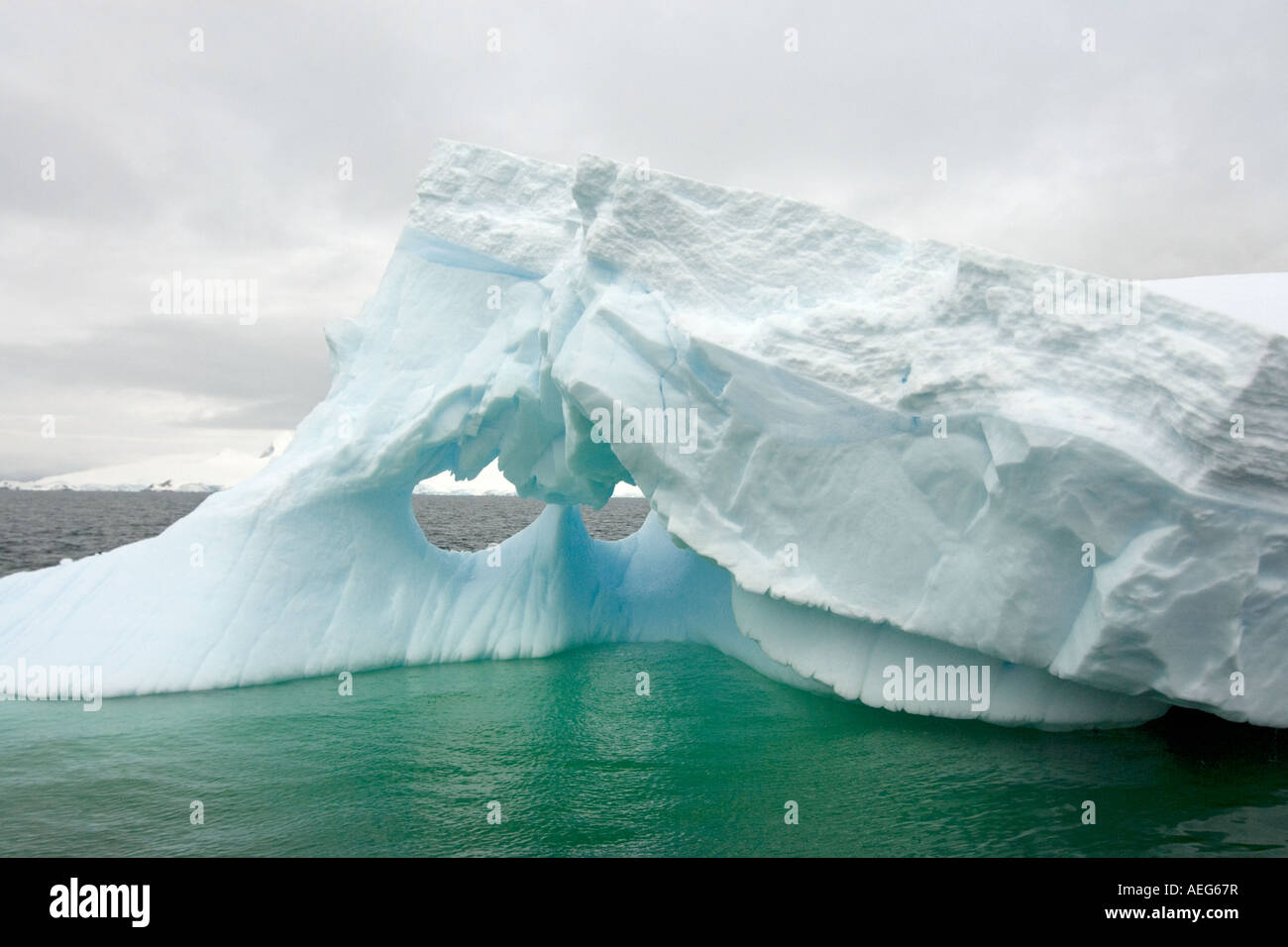 arched-iceberg-floating-off-the-western-antarctic-peninsula-antarctica
