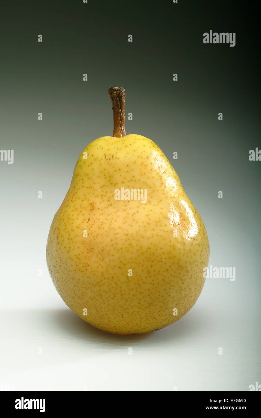 Fruits Vegetables pear pears stem sitting upright yellow yellowish food