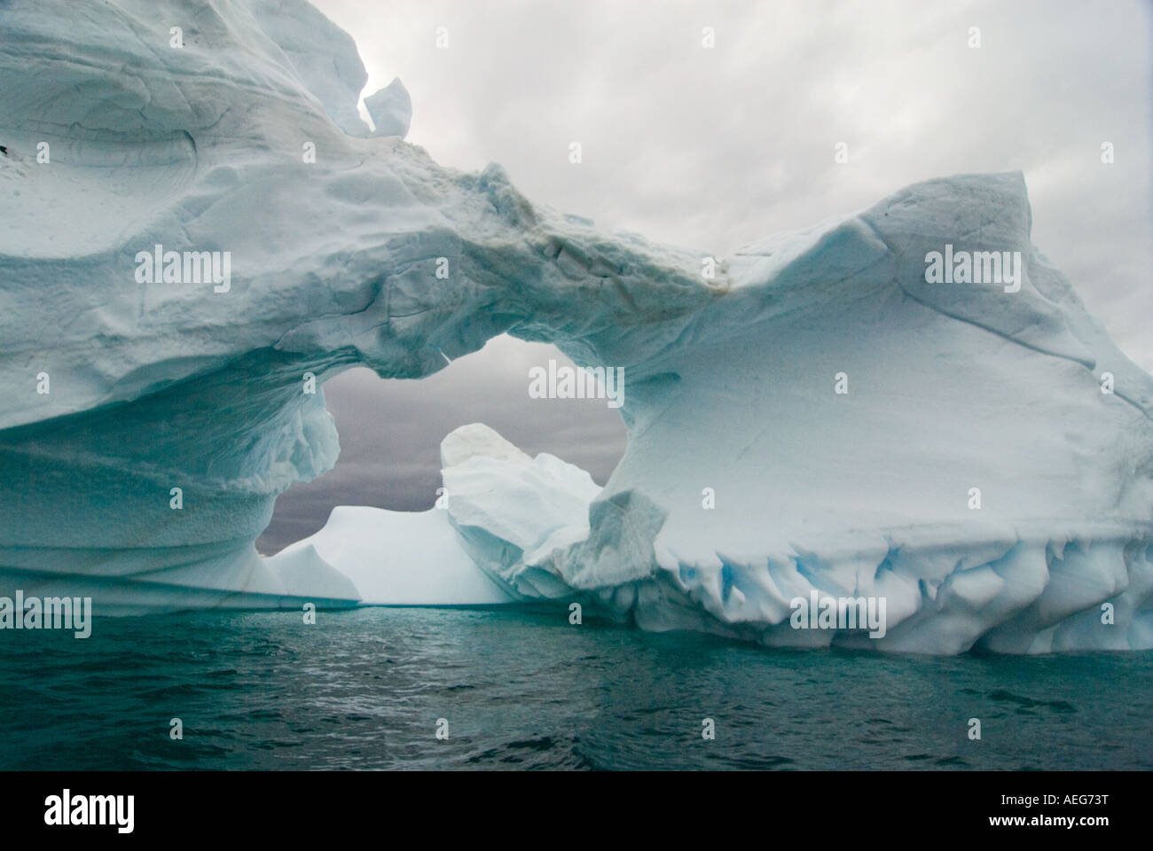 arched-iceberg-floating-off-the-western-antarctic-peninsula-antarctica