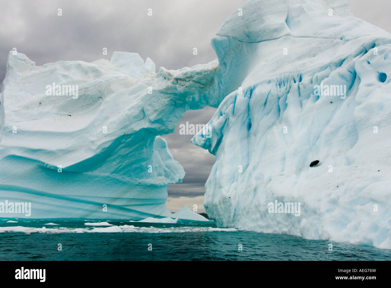 arched-iceberg-floating-off-the-western-antarctic-peninsula-antarctica