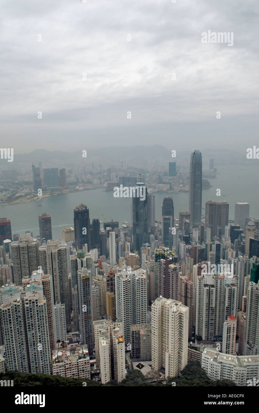 Hong Kong the harbour and Kowloon from 400 meter meters high. The view is often very bad due to the pollution. Stock Photo