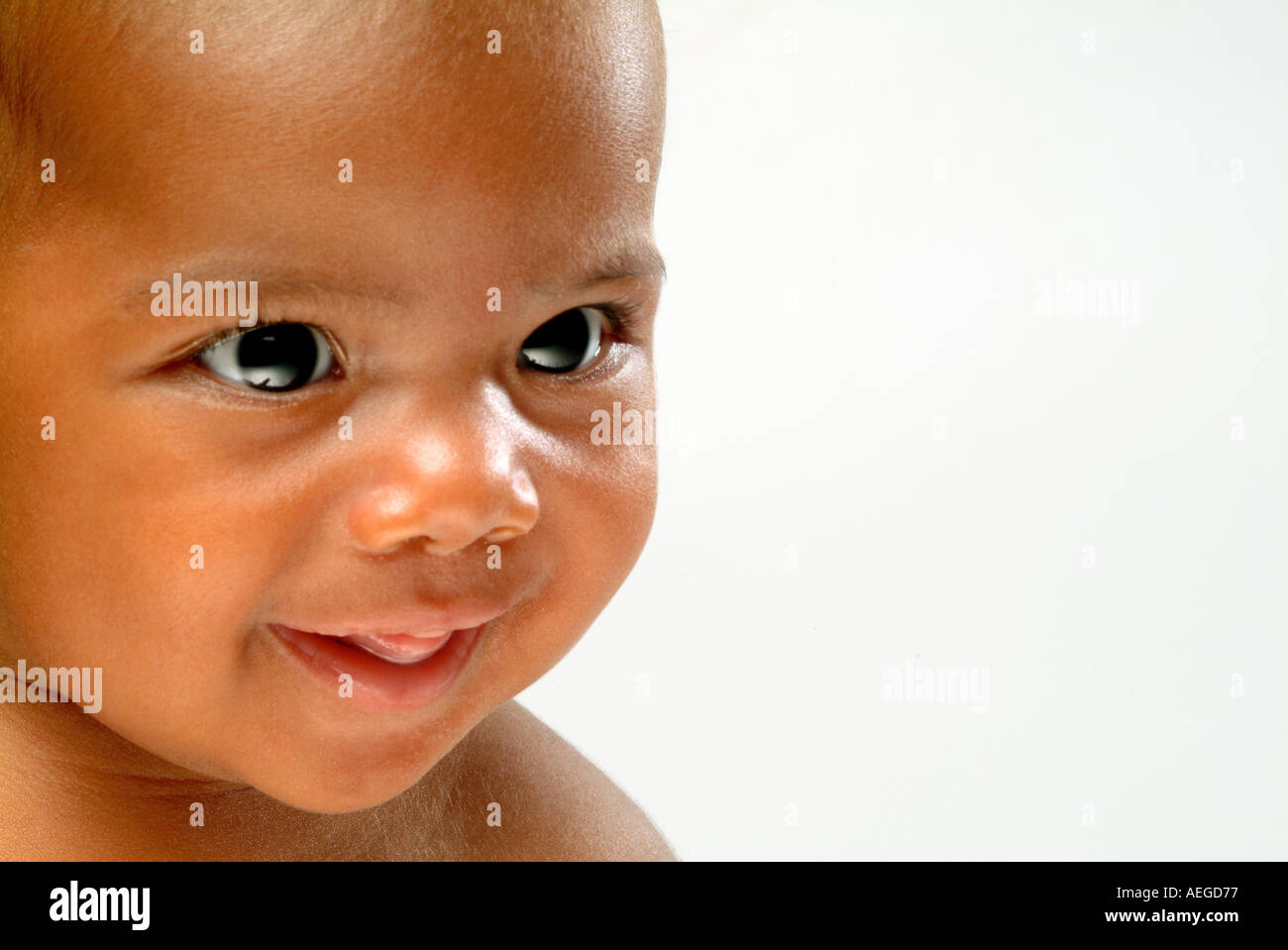Baby s World little black boy smiling smile happy happiness staring person  people kid child baby Stock Photo - Alamy