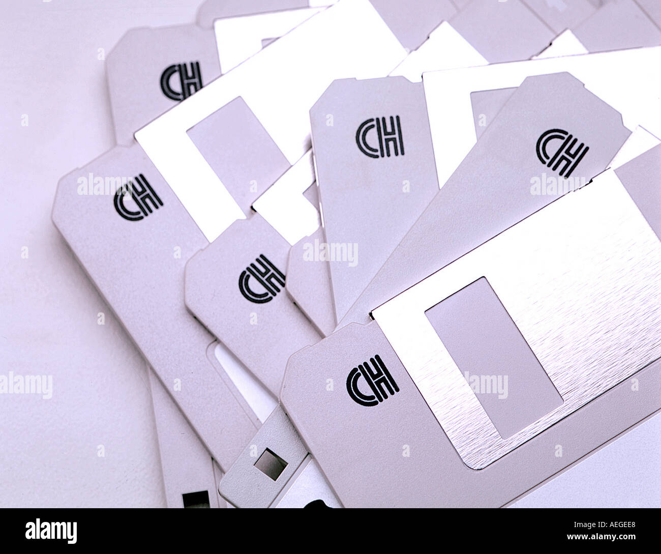 Office disk disks floppy drive media high density 3 1 4 diskette storage computer white stationery technology concept miscellane Stock Photo