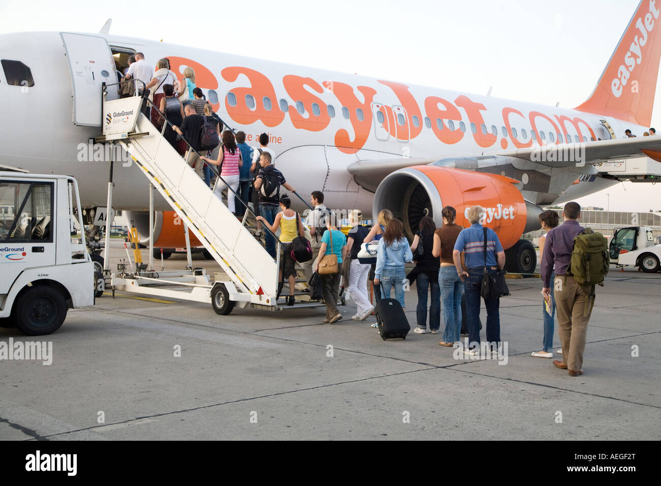Passengers Boarding EasyJet Aircraft in Schoenefeld Airport Berlin Germany Stock Photo