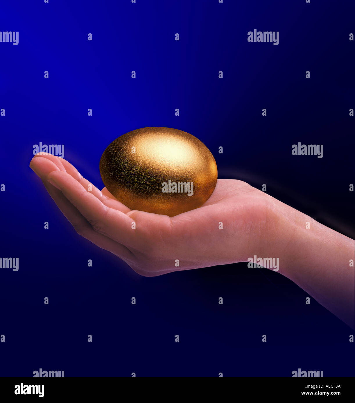 Office golden egg hand holding value valuable wealth resources gold money conceptual success miscellaneous background texture Stock Photo