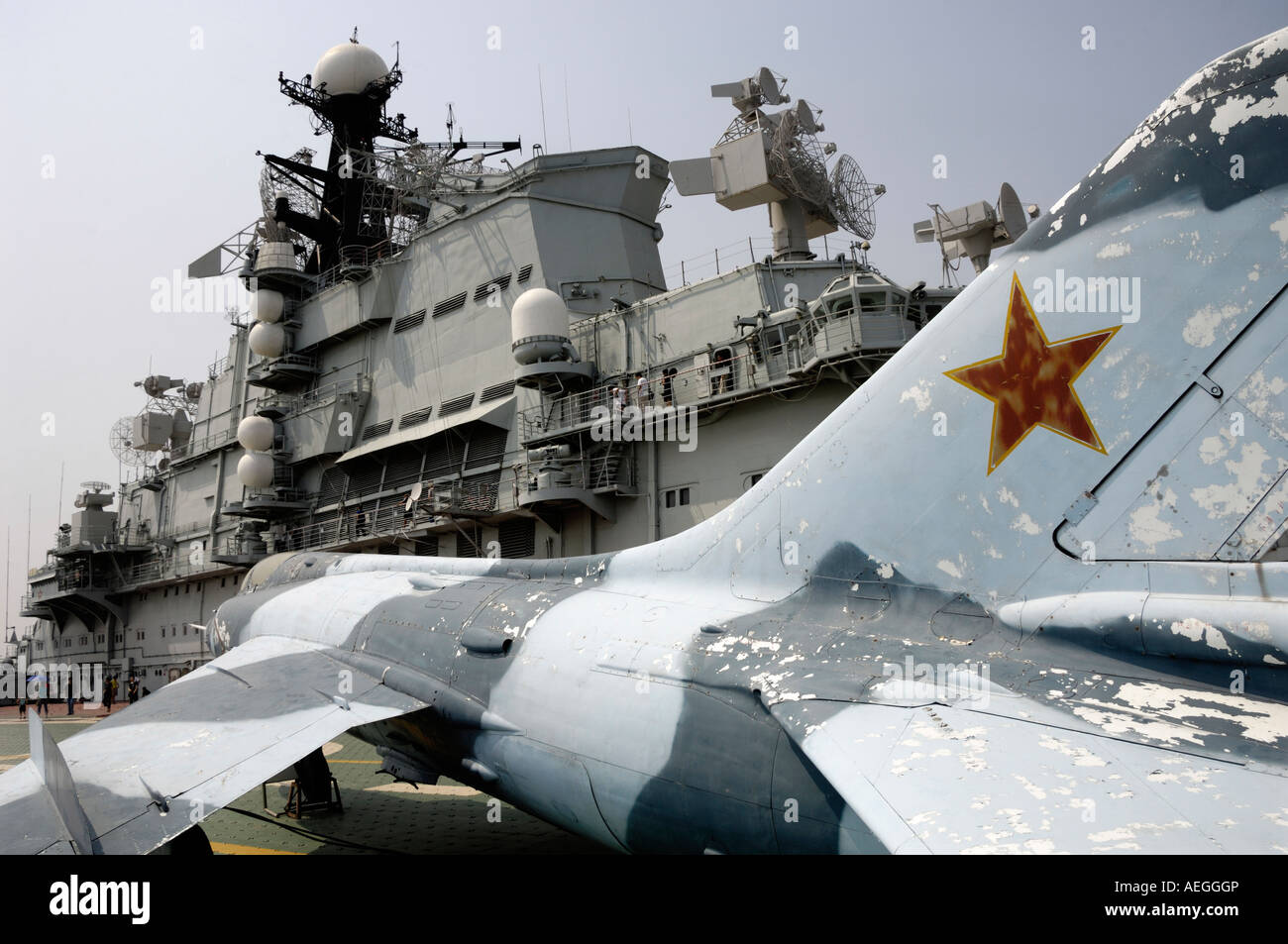 Soviet aircraft carrier Kiev and Su-27 aircraft in the military theme park in Tianjin China 19 Aug 2007 Stock Photo