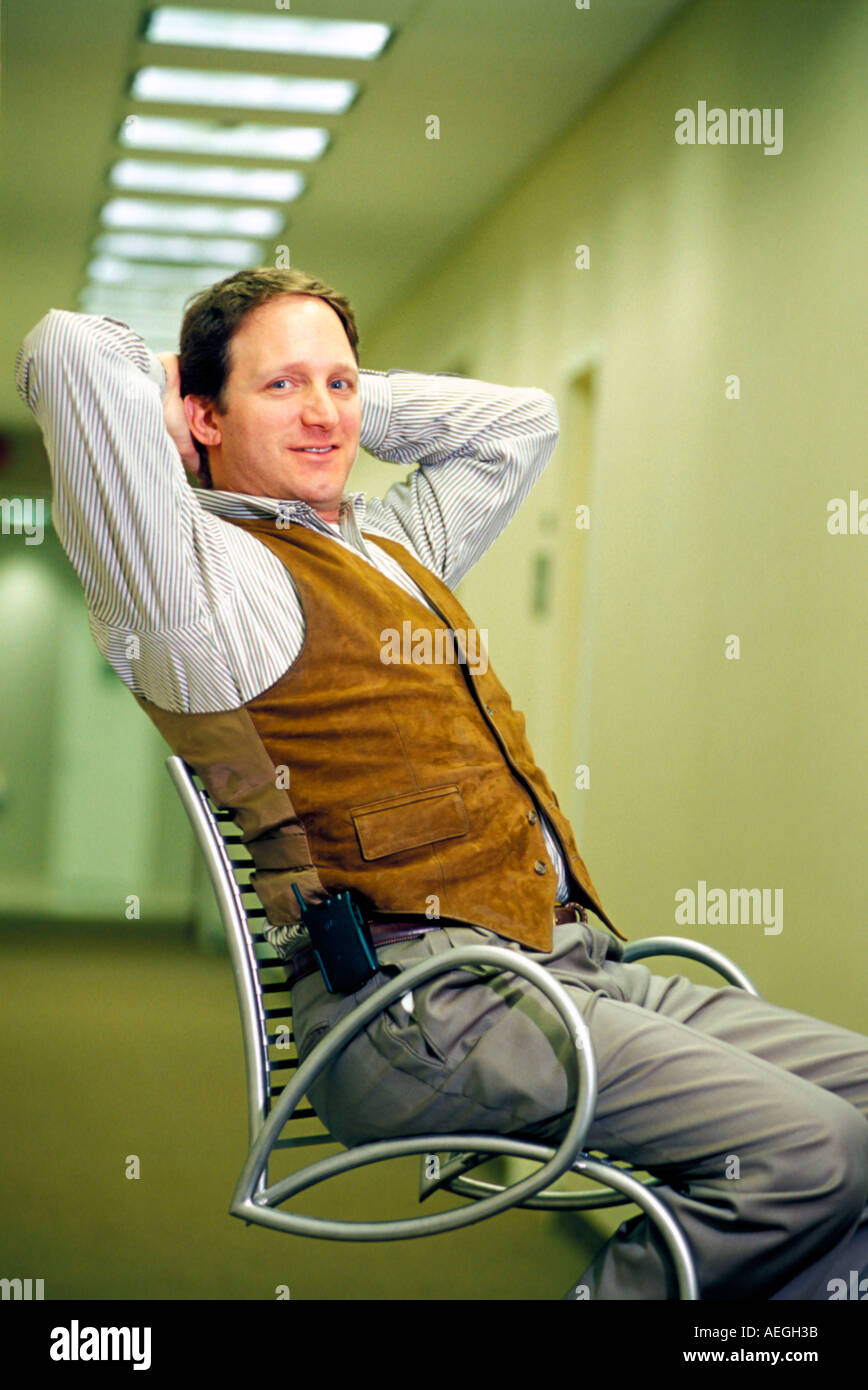Sitting hands behind the head hi-res stock photography and images - Alamy