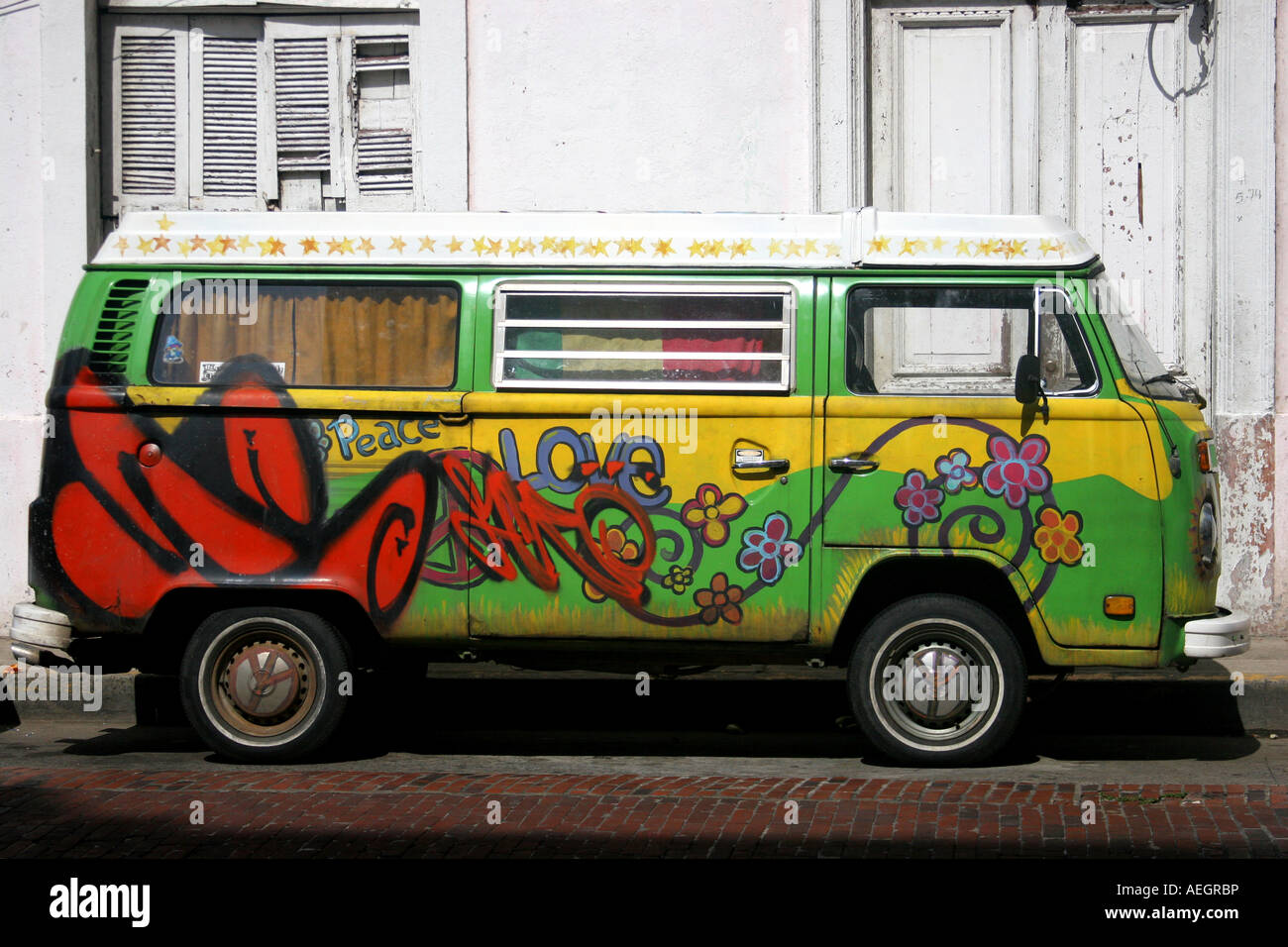 This is a common sight in the area, a colourful, colorful, minivan, trolley, artistically painted by its owner. Stock Photo