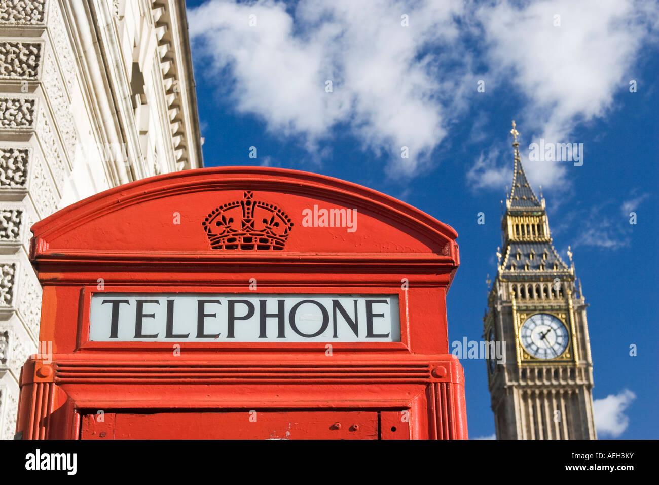 Red Phone box and Elizabeth Tower or Big Ben London Against blue sky Stock Photo