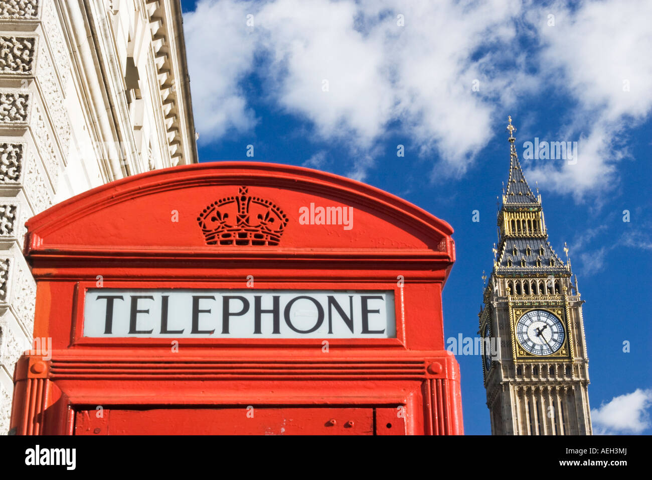 Red Phone box and Elizabeth Tower or Big Ben London Against blue sky Stock Photo