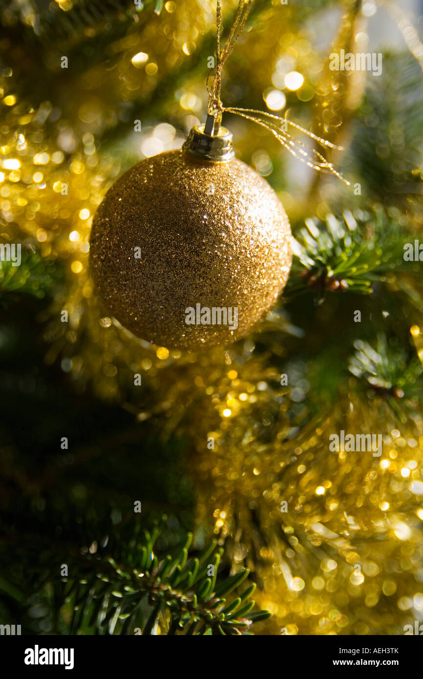 Gold coloured christmas decorations Stock Photo