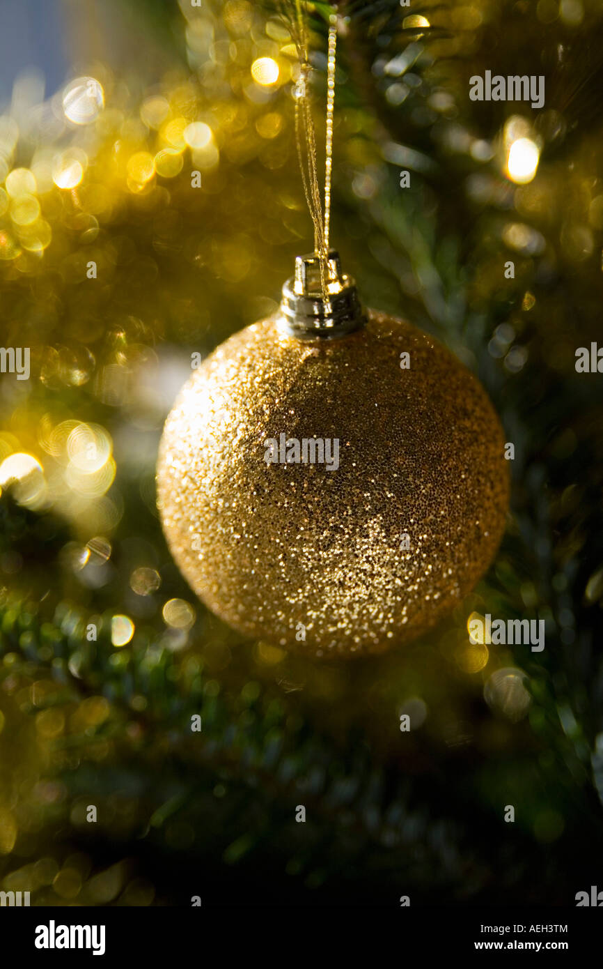 Gold coloured christmas decorations Stock Photo