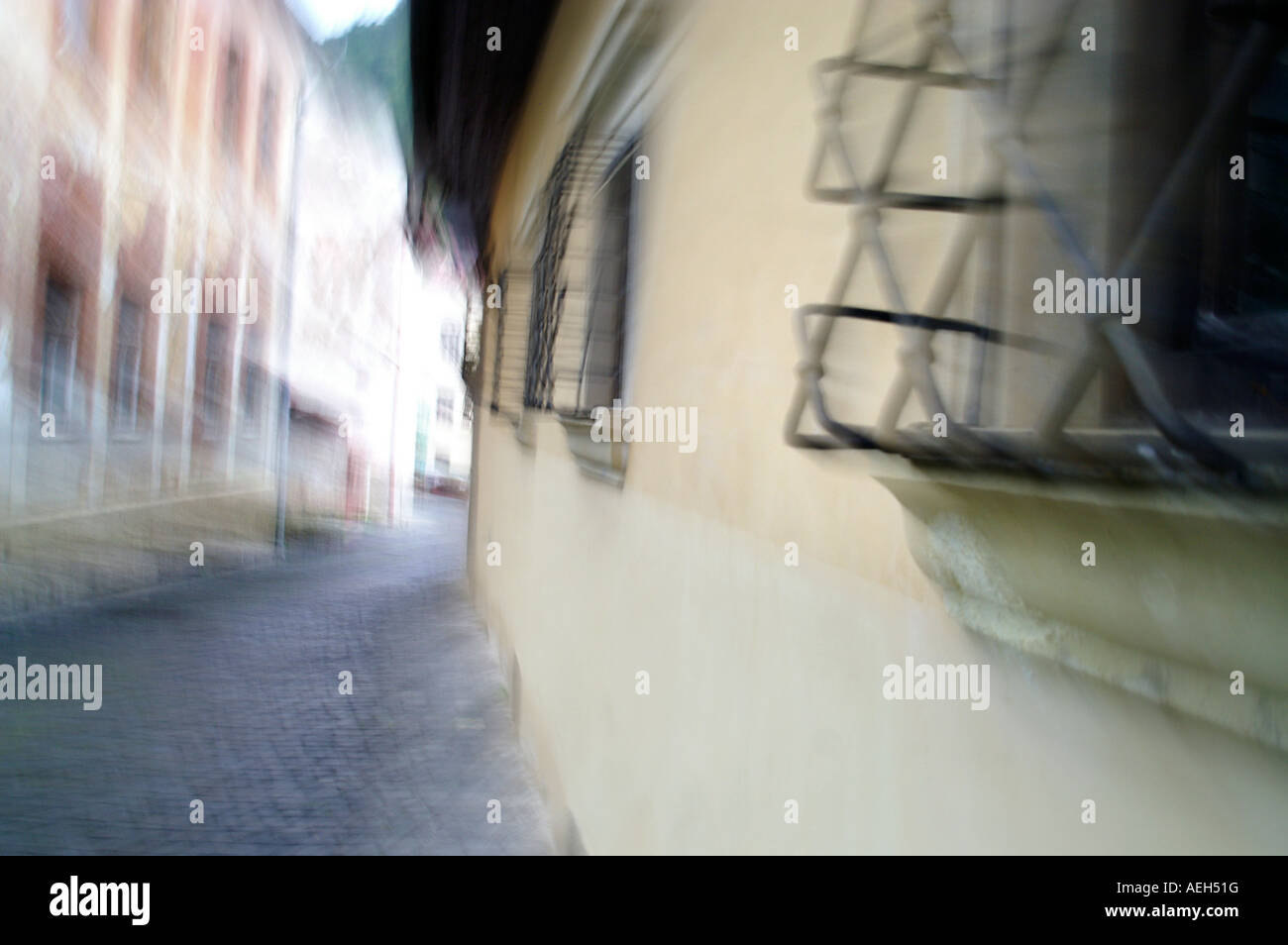 Distorted zoomed street medieval facade lattice window architecture Banska Stiavnica Slovakia UNESCo cultural heritage Stock Photo