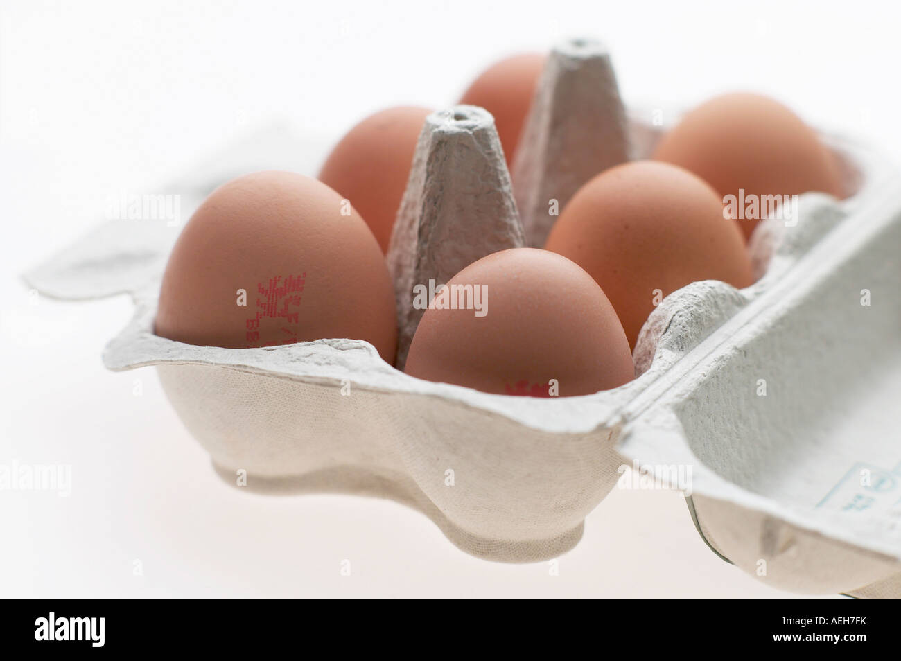 ENGLISH CHICKEN EGGS IN A WHITE CARTON ON A CLEAN BACKGROUND Stock ...