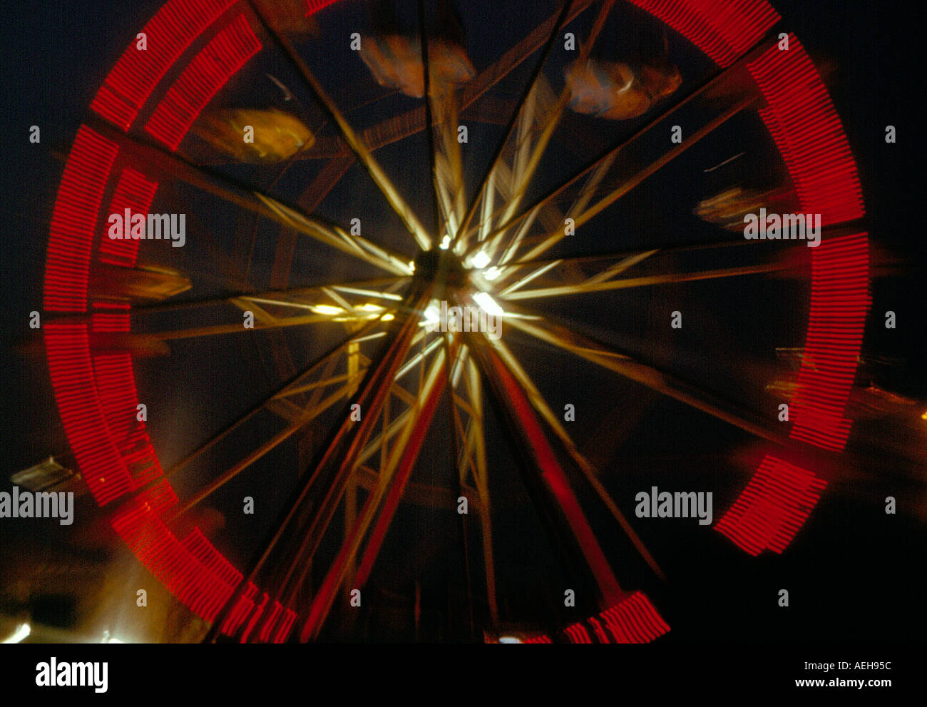 Ferris wheel in motion at night at the Oktoberfest, Munich Bavaria