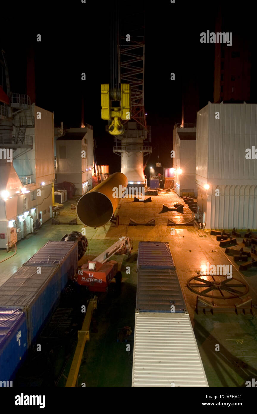 Deck at night of the Jackup ship the Resolution with monoplie on deck