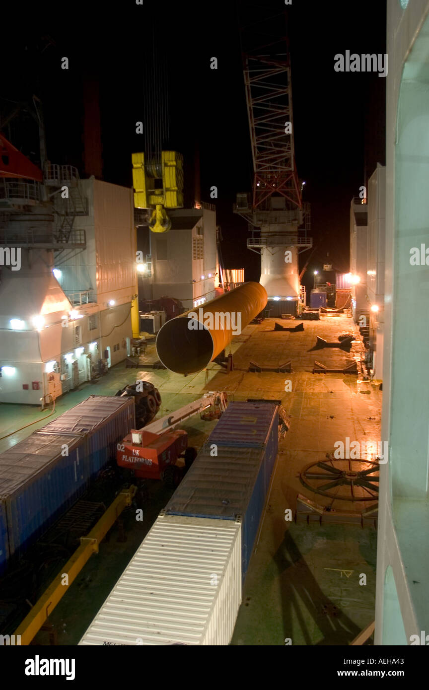Deck at night of the Jackup ship the Resolution with monoplie on deck