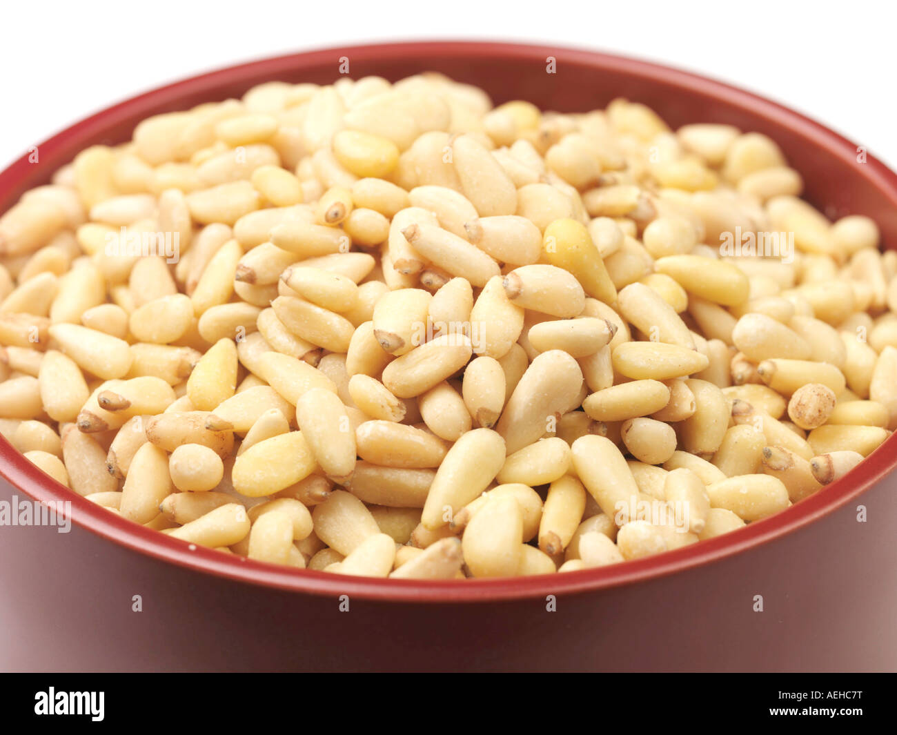 Bowl of Healthy Vegetarian Pine Kernels Or Nuts Against A white ...