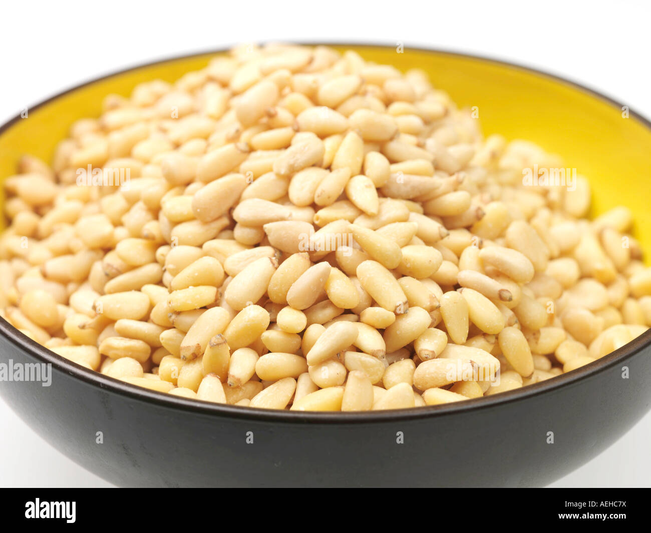Bowl of Healthy Vegetarian Pine Kernels Or Nuts Against A white ...