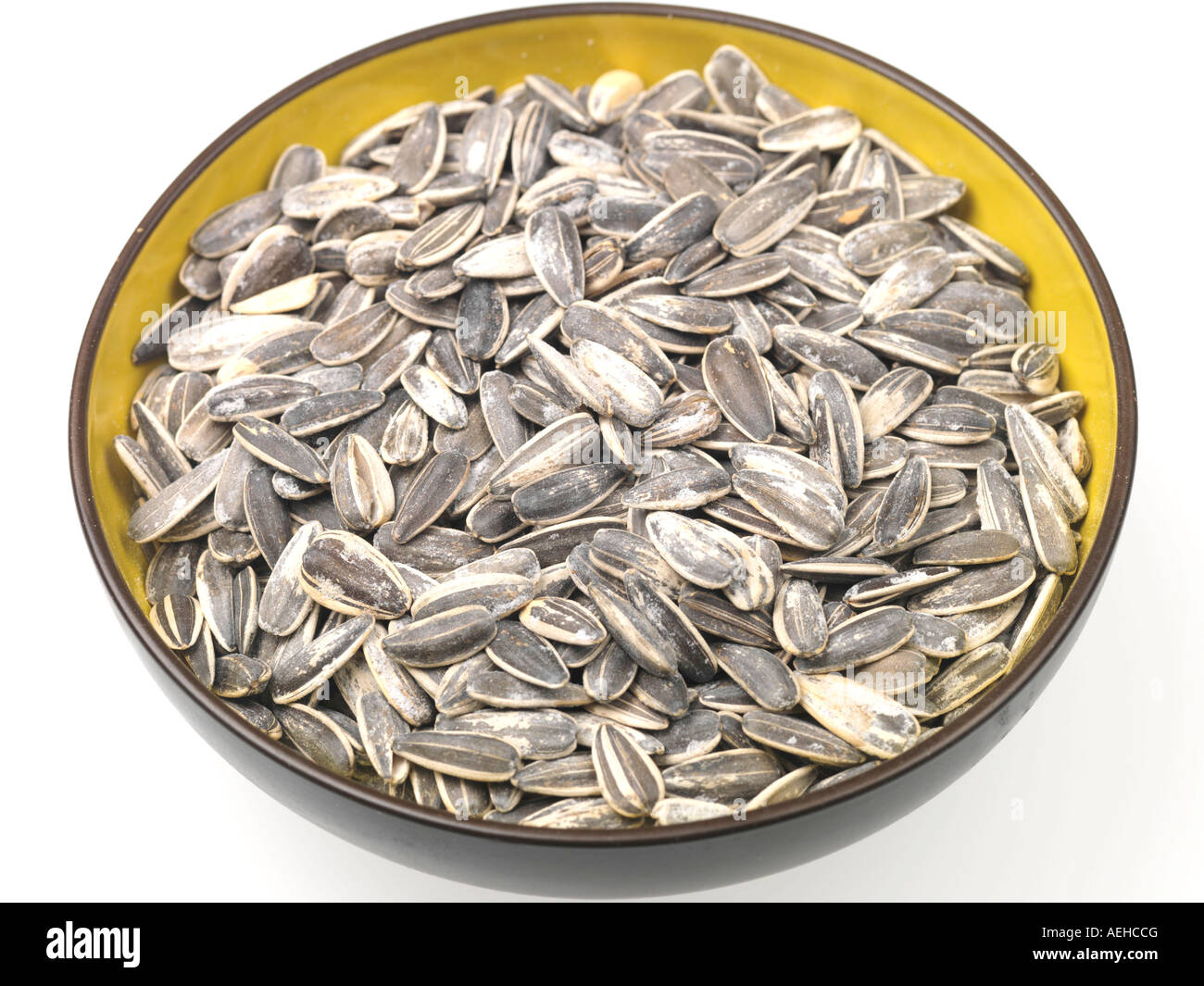 Dried Healthy Edible Sunflower Seeds Isolated Against A White Background With A Clipping Path And No People Stock Photo