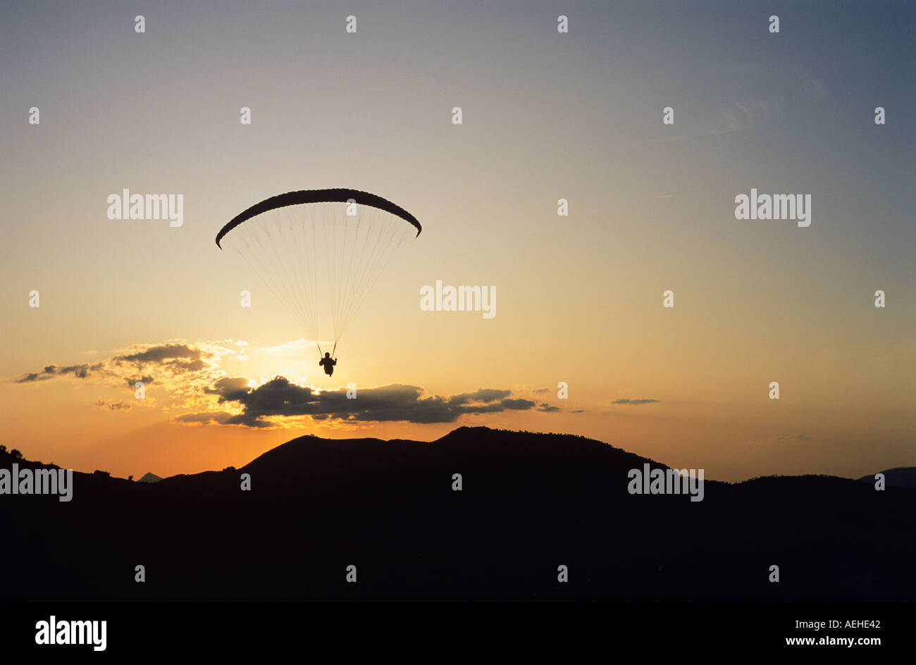 Paragliding at Sunset, Ronda, Andalucia, Andalusia, Spain. parapenting mountain sunset freedom liberty adrenaline sports flying Stock Photo