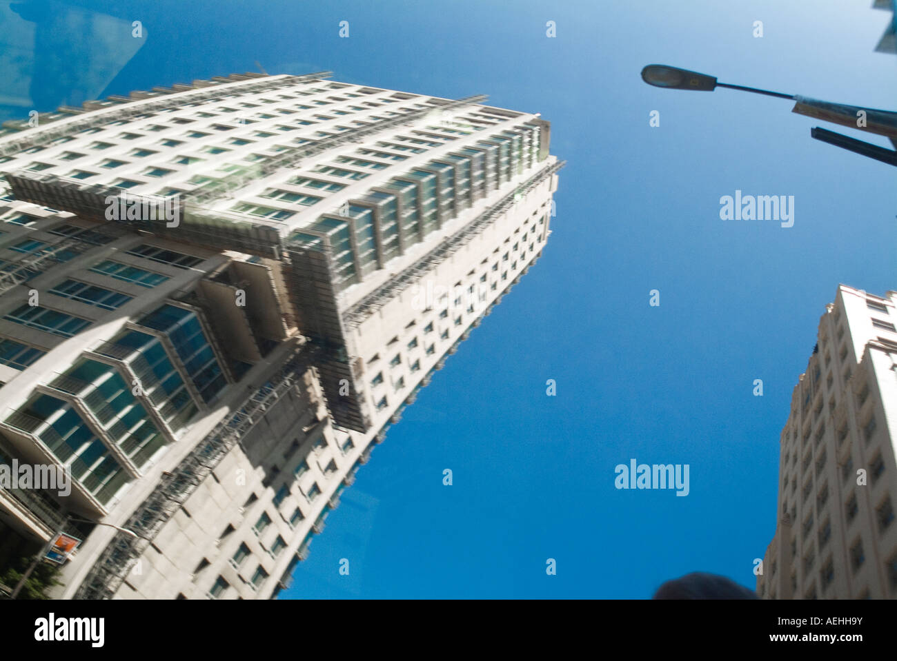 Blurred reflection of urban building in car window Stock Photo