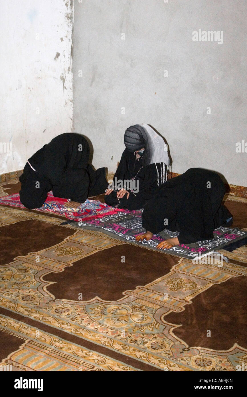 Surman, Libya, near Tripoli. Girls Praying in the Madrasa of Sidi Rashid al Galili. Stock Photo