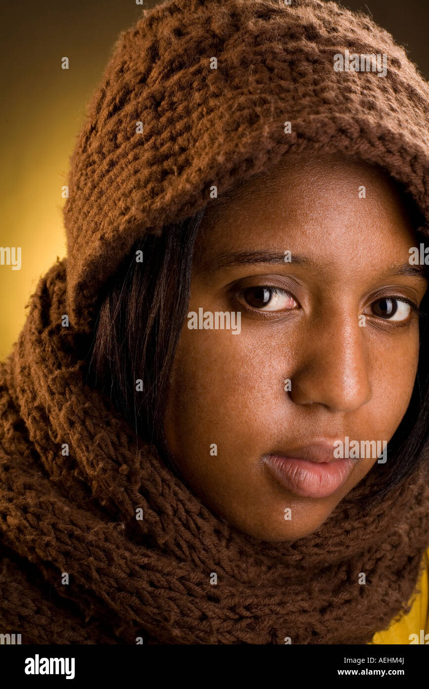 African American woman with hat and scarf Stock Photo - Alamy