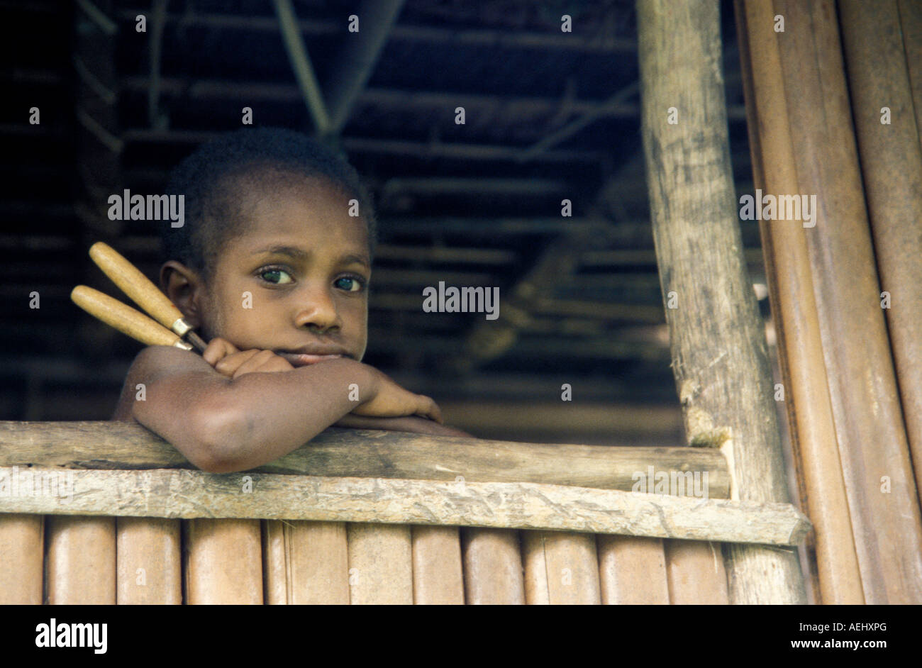 Boy in a village along Sepik River Papua New Guinea Stock Photo