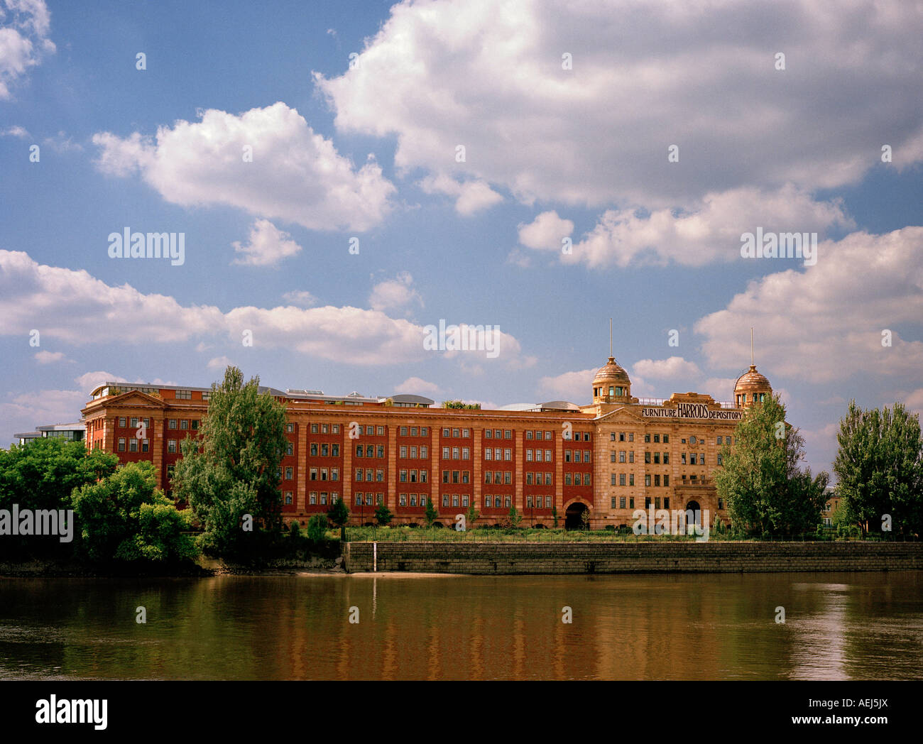 Harrods Depository converted into luxury apartments, alongside the River Thames, Barnes, London, England, UK. Stock Photo