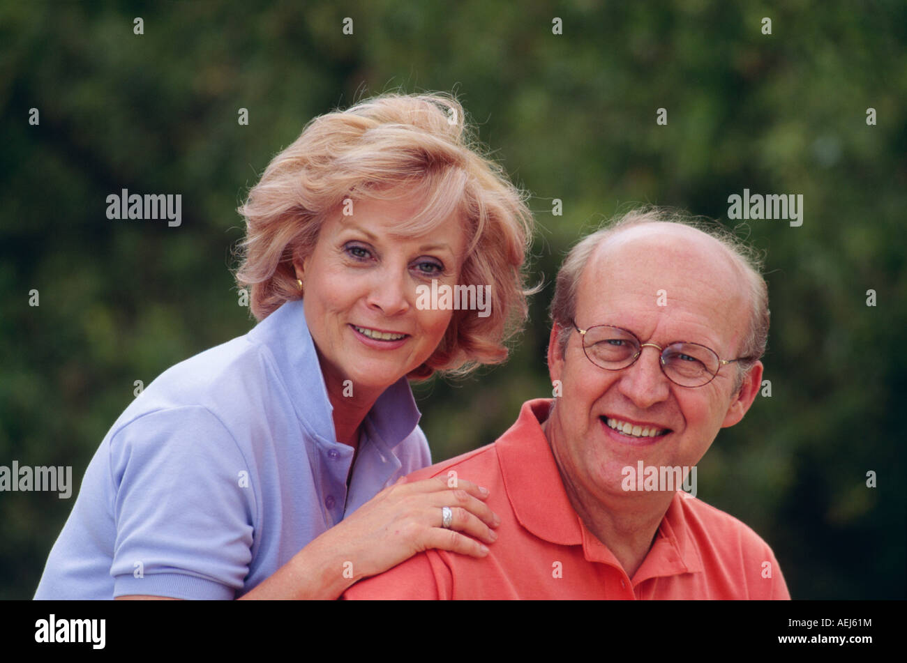 Attractive Happy senior citizens  citizen Mature couple smiling portrait Stock Photo
