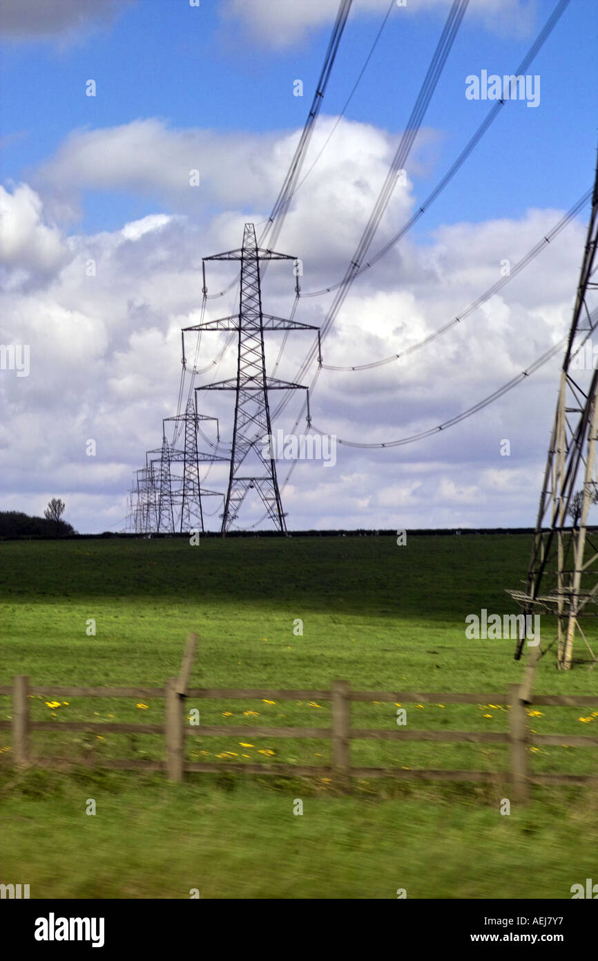 Electricity pylons receeding to horizon Stock Photo