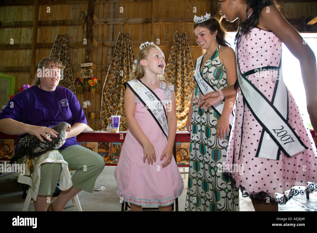 ILLINOIS Grayslake Miss Lake County Little Miss and Junior Miss in poultry barn at Lake County Fair Stock Photo