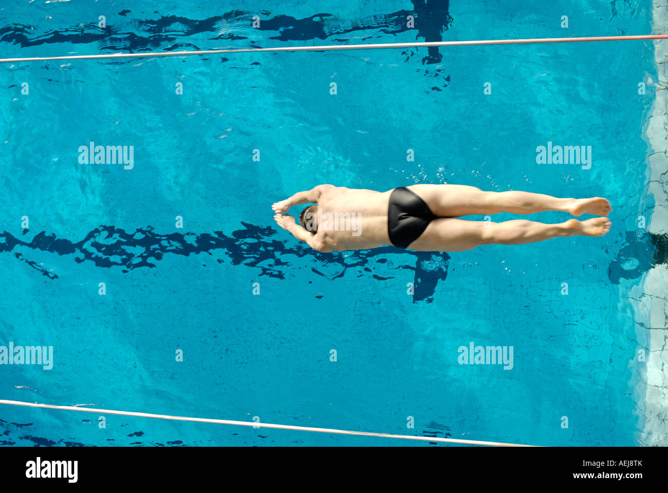 Man swimming in a swimming hall Stock Photo