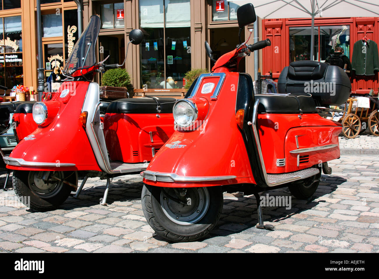 Two red vintage cars scooter type Heinkel Tourist Stock Photo