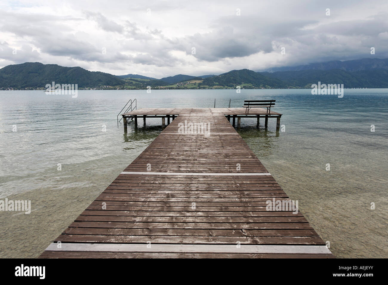 Wooden plank of a swimming bath at the Attersee, before a heavy thunderstorm, Salzkammergut, Upper Austria Stock Photo