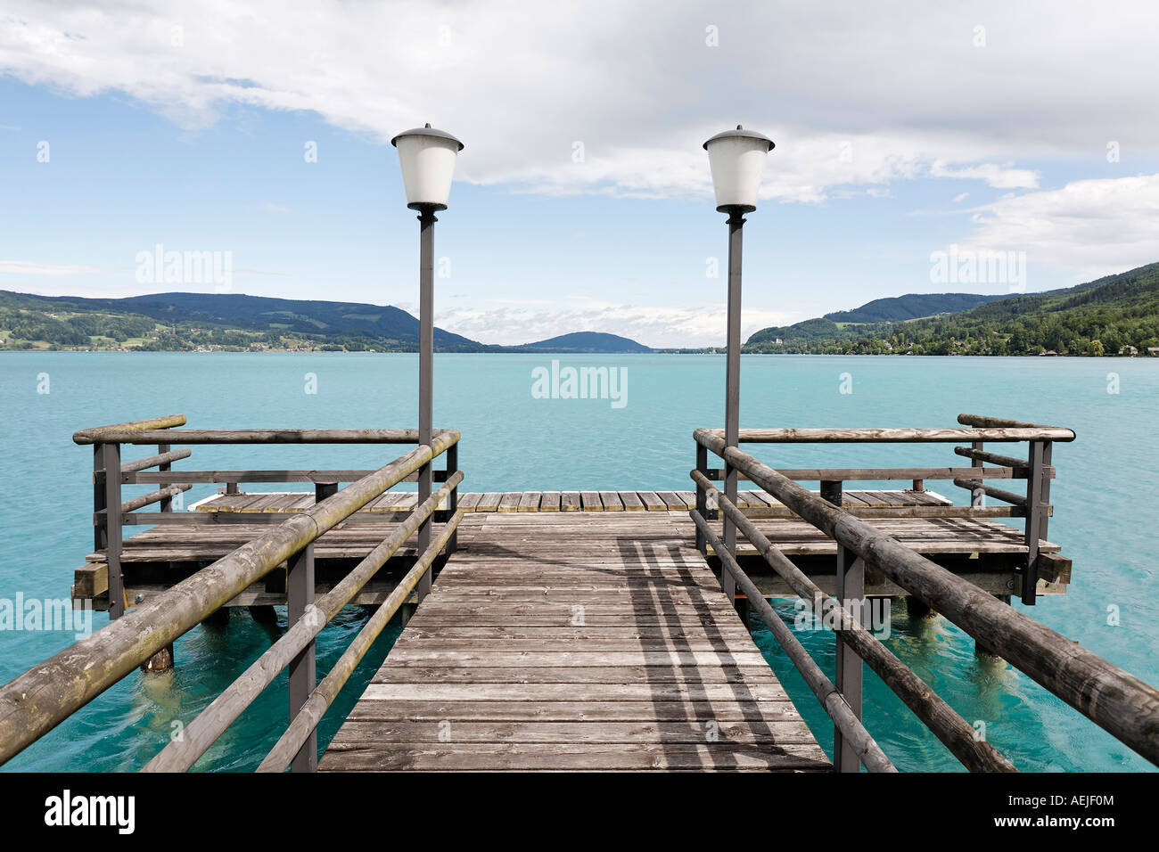 Wooden landing stage one the edge of the lake Attersee, Salzkammergut, Upper Austri Stock Photo