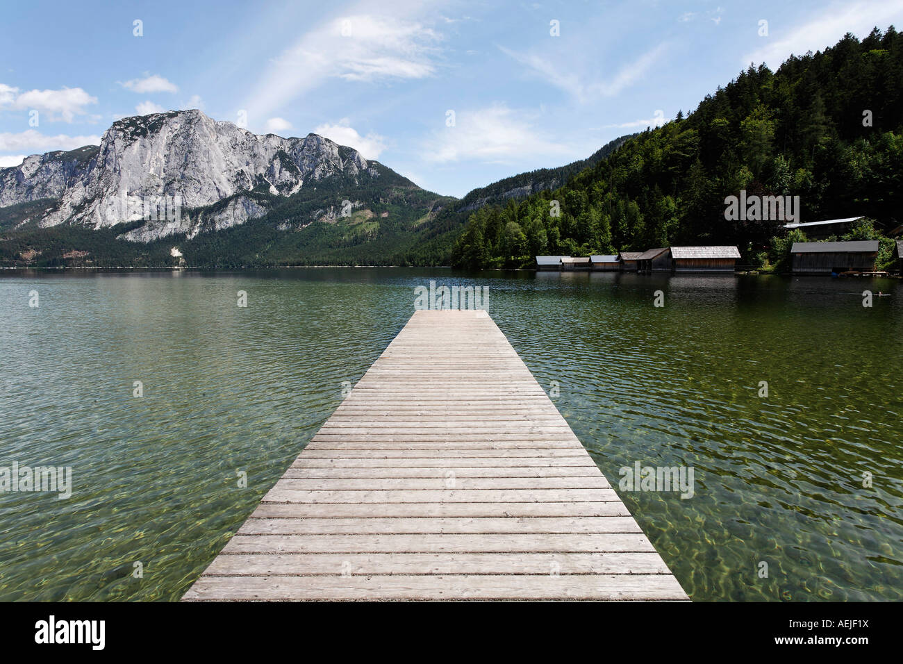 Landing stage leading into the lake Altaussee, Salzkammergut, Styria, Austria Stock Photo