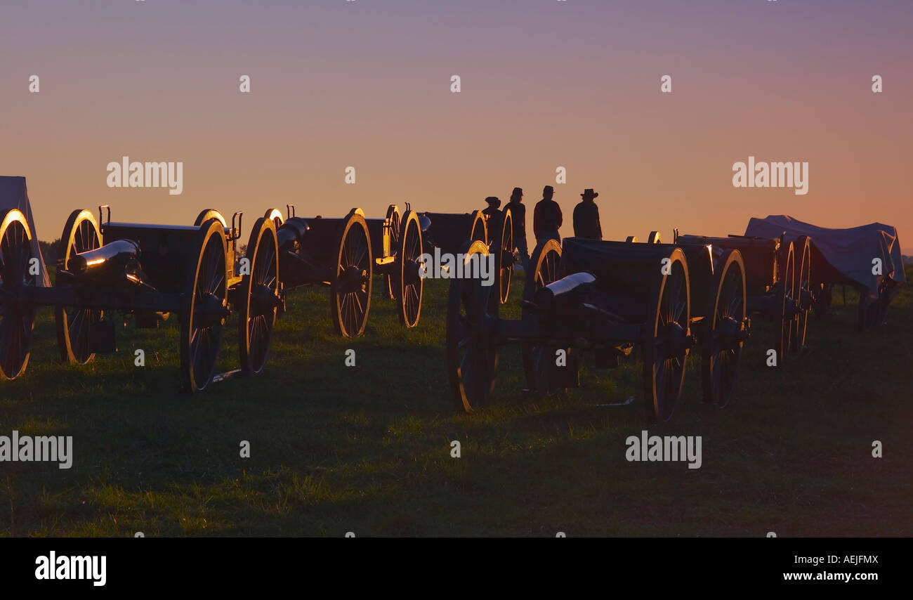 American Civil War soldiers and cannons in the Union campground at dusk during reenactment of the Battle of Third Winchester Stock Photo