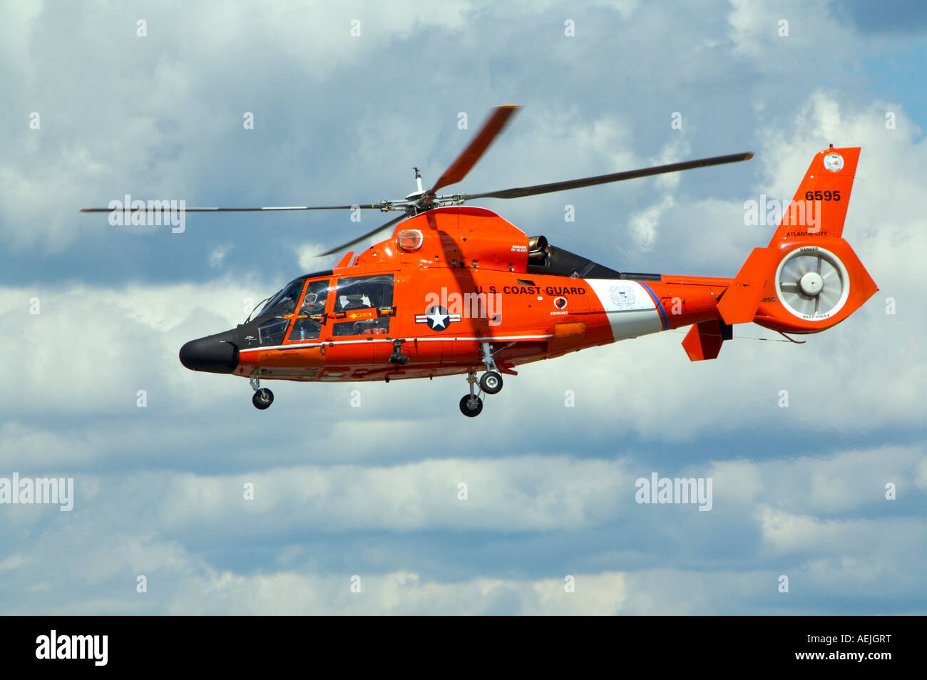 A US Coast Guard HH 65B SAR Helicopter demonstrates a search and rescue mission at Binghamton Airshow New York Stock Photo