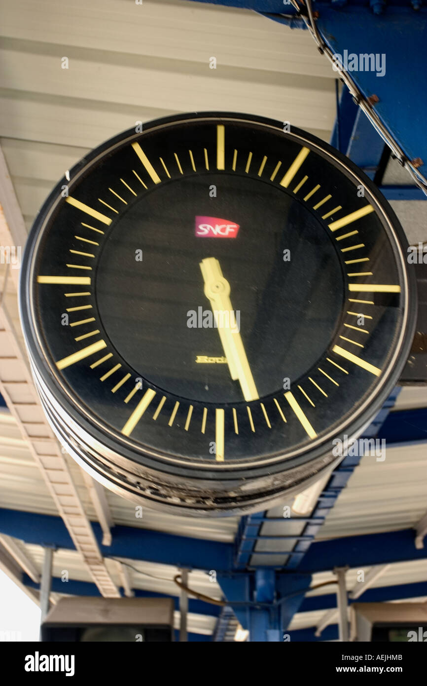 Clock on a wall french rail station sncf Stock Photo Alamy
