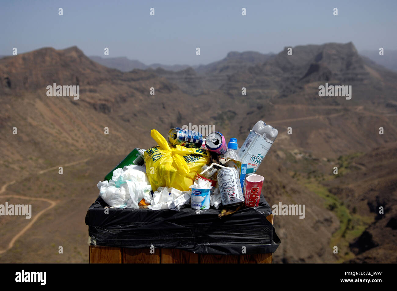 Crammed trash can in nature reserve, Gran Canaria, Canaries, Spain Stock Photo