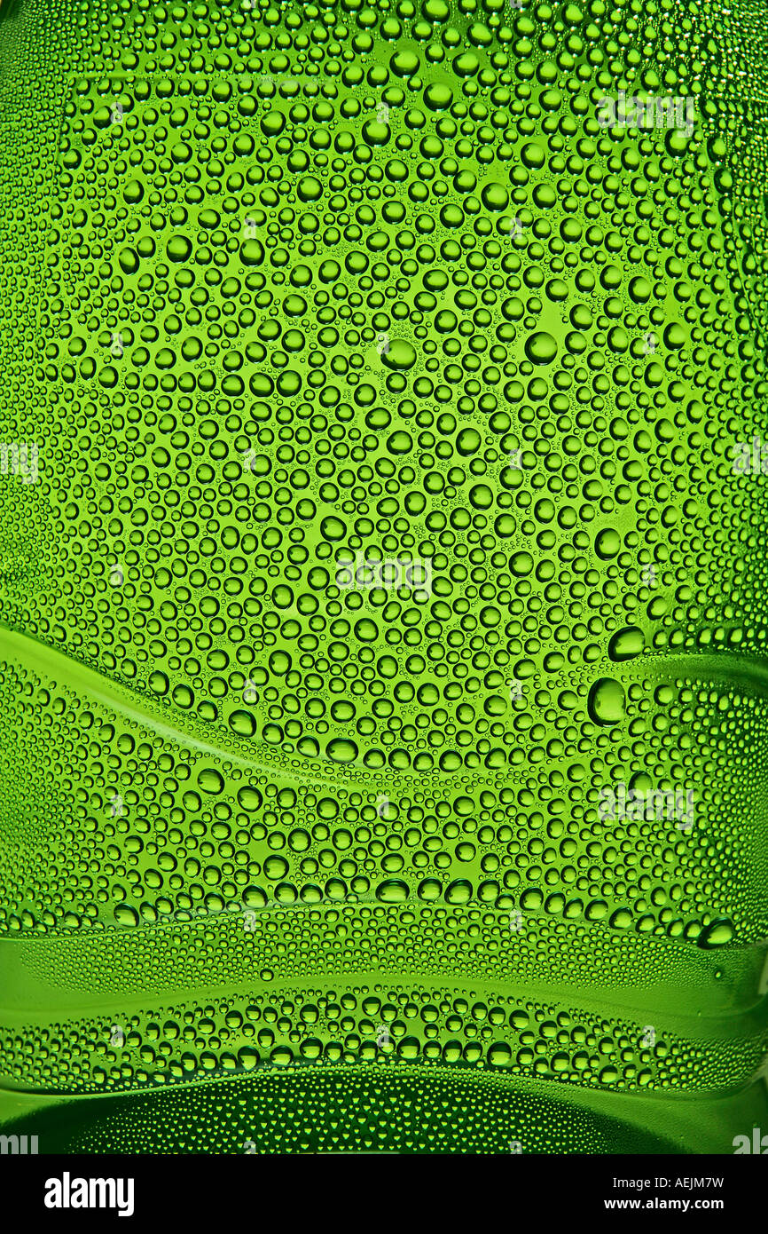 Condensed drops in yellow-green Waterbottle Stock Photo