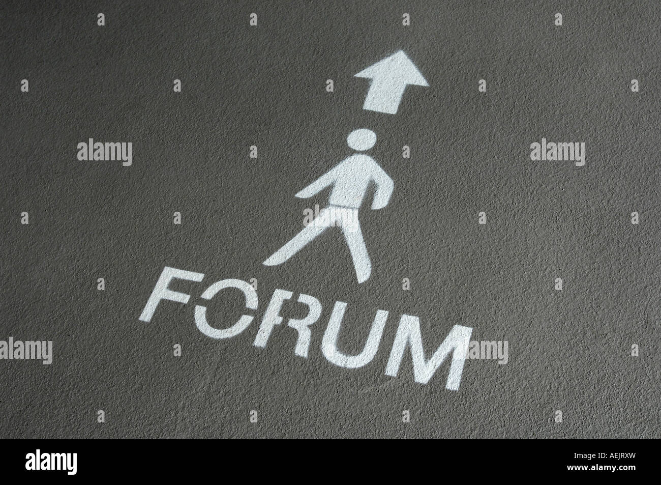 Icon: "Forum" painted on the floor. Stock Photo