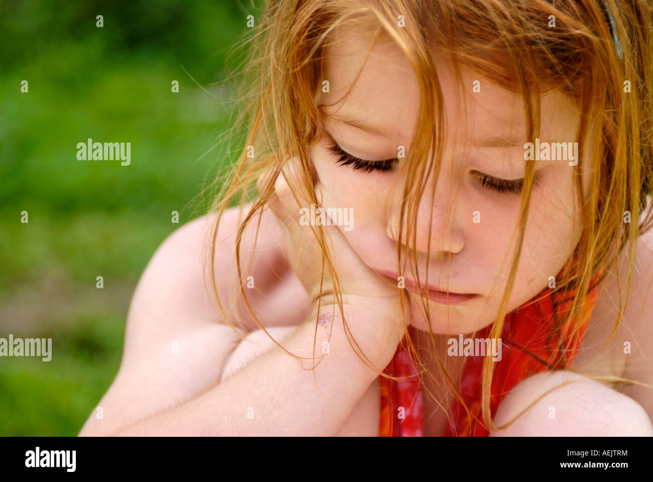 Little girl sad crying Stock Photo