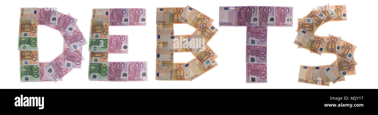 Debts, written with bank notes Stock Photo
